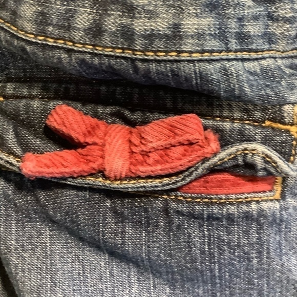 GYMBOREE blue jeans with red flowers and bows. Size 12-18 months. - Picture 3 of 5
